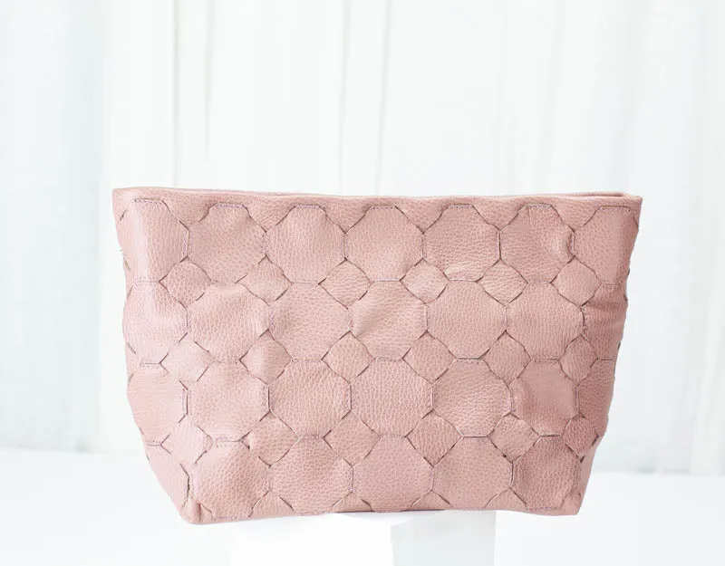 Helon clutch - Handwoven dusty pink leather